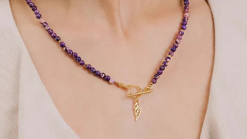 Naszyjnik z kółkiem co oznacza: odkryj jego głęboką symbolikę